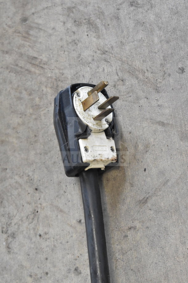Power plug of Turbochef HhC2020 oven. Black and white design, Hubbell label visible. Commercial use.
