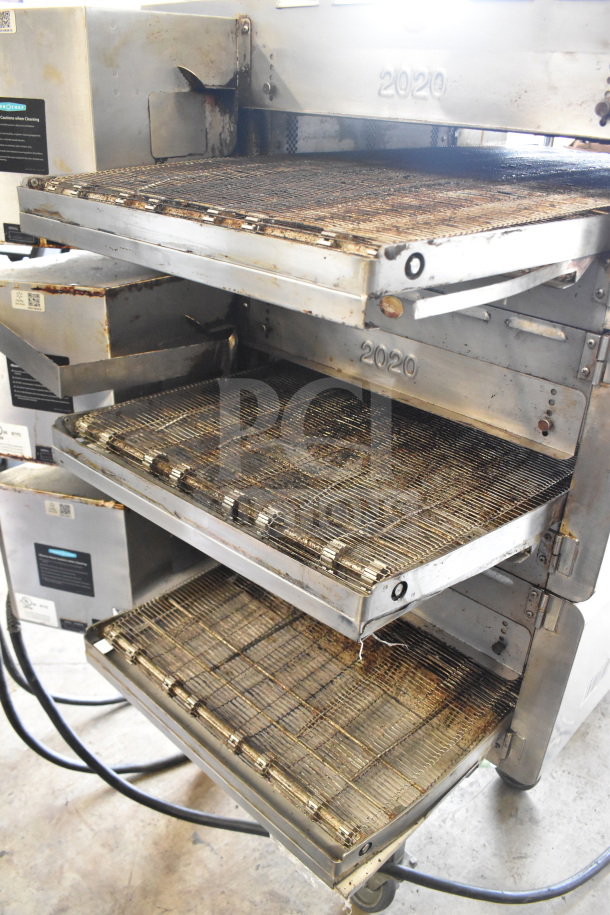 Turbochef HhC2020 commercial conveyor oven, 2022 model, electric, 3-phase, mounted on stand with casters.