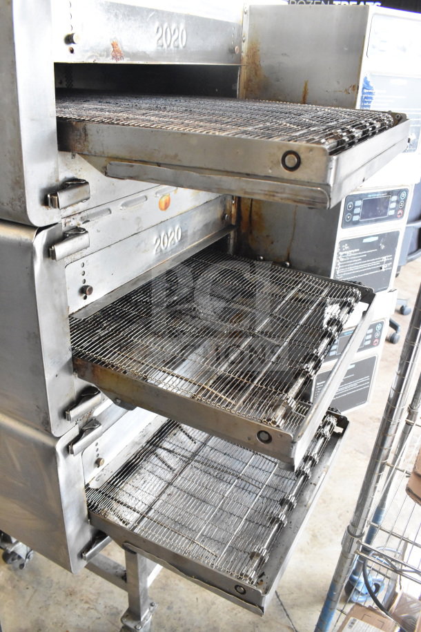 Three 2022 Turbochef HhC2020 commercial electric conveyor ovens with stand, 208/240V, 3 phase, on casters. Slight wear visible.