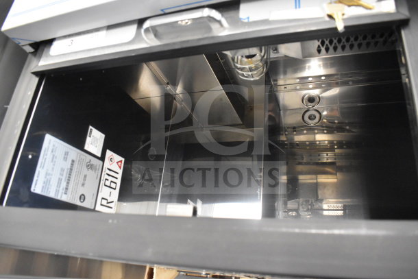 Brand new Perlick BC60RT-3 bottle cooler, stainless interior, 115V, scratch and dent, with labels and keys shown.