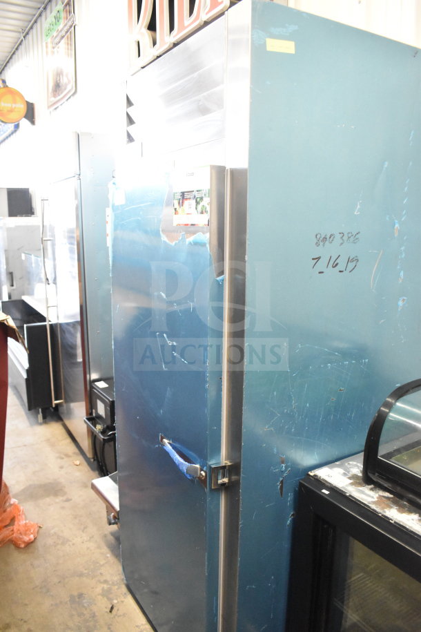 Traulsen ARI132LUT-FHS Commercial 36" Roll-In Refrigerator, 115 Volts, single door, visible markings, fair condition.