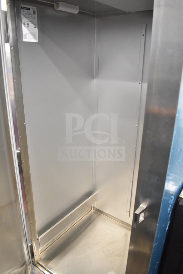 2019 Traulsen ARI132LUT-FHS 36" single door roll-in refrigerator, clean interior, visible specs label, 115V, 1 Phase.