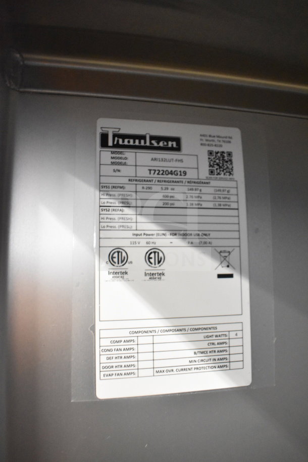 Traulsen ARI132LUT-FHS commercial refrigerator label; 115V, single phase. Model and serial number visible.