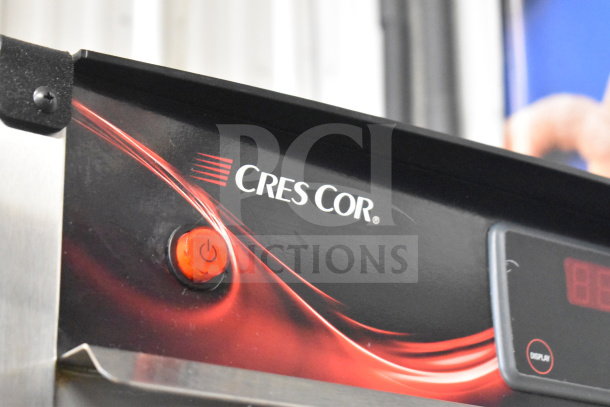 CresCor H137SUA12D full-height insulated mobile heated cabinet with 120V, 1 phase. Features digital display and power button.