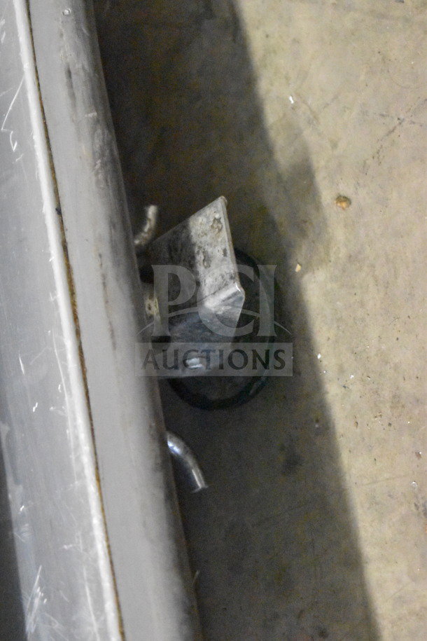 CresCor H137SUA12D commercial heated holding cabinet wheel and handle detail, showing heavy-duty construction and commercial casters.