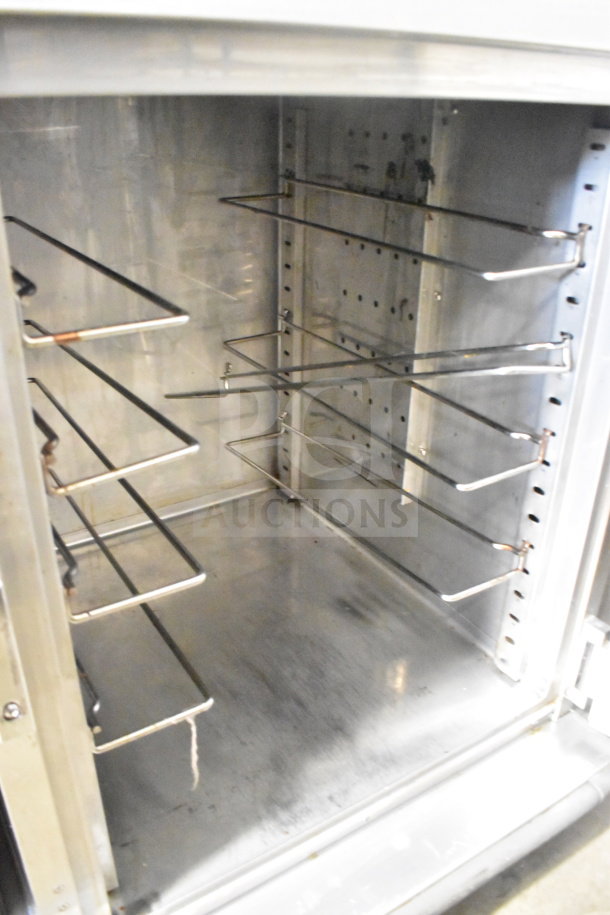 CresCor H137SUA12D full-height insulated mobile heated cabinet, stainless steel interior, on commercial casters, 120 volts.