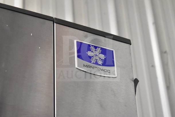 Manitowoc SD0452A Ice Head on SPA310 Dispenser, stainless steel, 115V, 1 phase. Visible Manitowoc logo plate.