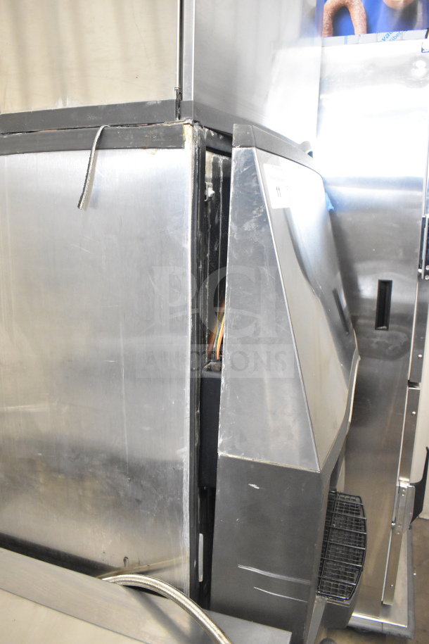 Manitowoc SD0452A ice head on SPA310 dispenser, stainless steel finish, slightly worn, 115V, 1 phase.
