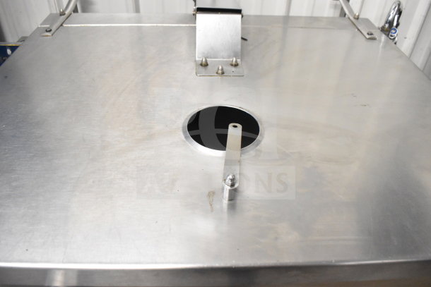 Groen commercial braising pan, natural gas powered, 104,000 BTU, stainless steel, floor style, good condition, visible control lever.