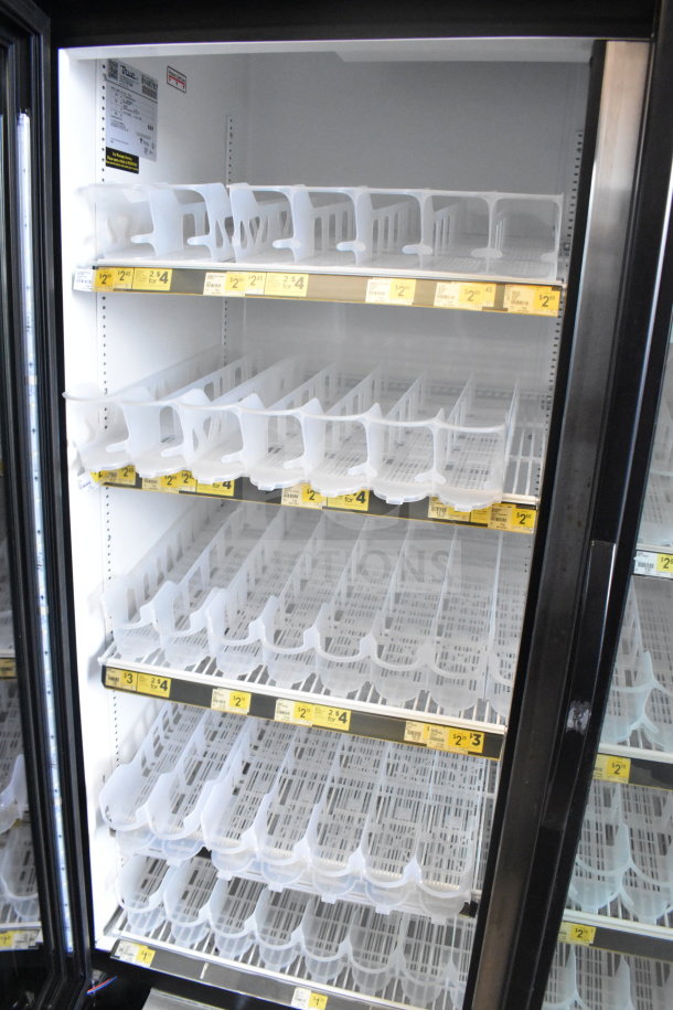 2017 True GDM-49-HC cooler merchandiser, 2-door, 115V, 1-phase, tested working, clean shelves, visible labeling.