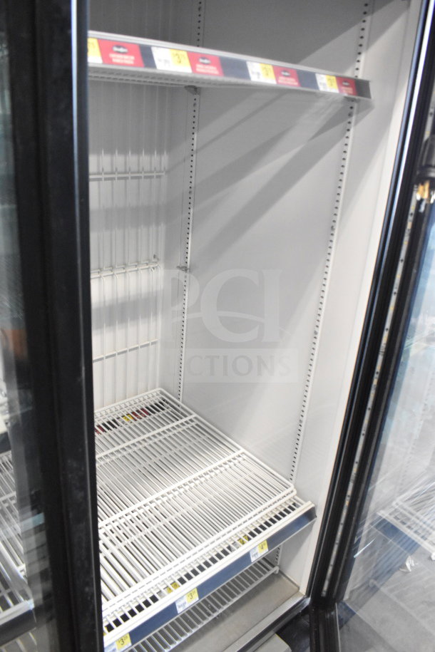 2017 True GDM-72F-HC 3 Door Commercial Freezer, shelves visible, tested and working, 115/208-230V, 1 Phase.