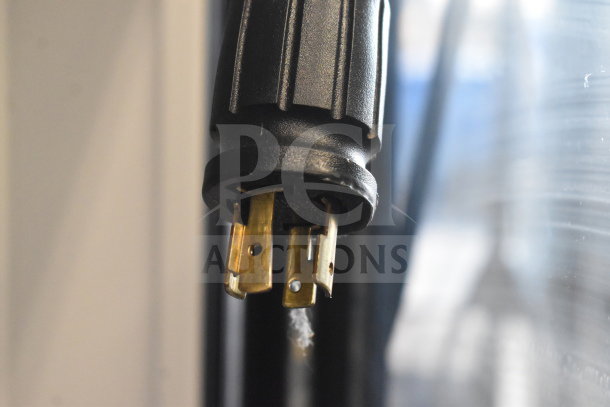 Close-up of power plug for 2017 True GDM-72F-HC commercial 3-door freezer, 115/208-230 volts, 1 phase.