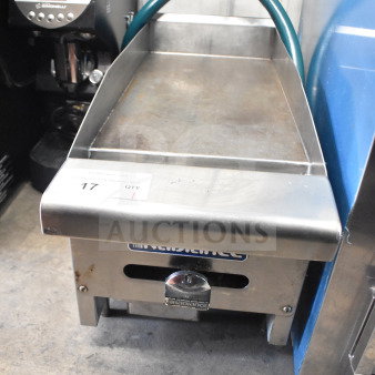 Radiance commercial countertop gas griddle, stainless steel, flat top, used condition, visible Radiance logo and control dial.