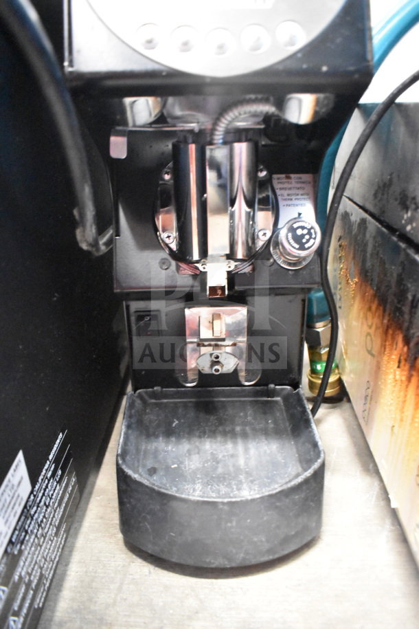 Nuova Simonelli Mythos One Clima Pro espresso grinder, 115V, 1 Phase, commercial use, features visible in working condition.
