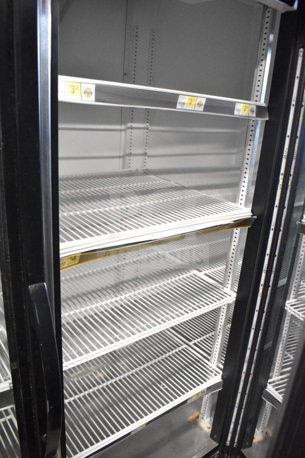 2017 True GDM-72-HC 3 Door Reach In Cooler Merchandiser, 115V, 1 Phase, clean, tested, and working, with adjustable shelves.