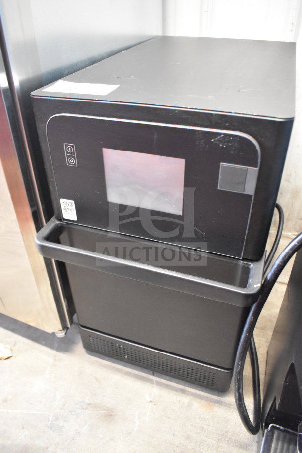 2025 Merrychef eikon e2s countertop oven, black finish, touchscreen, high-speed microwave convection, 208/240 volts.