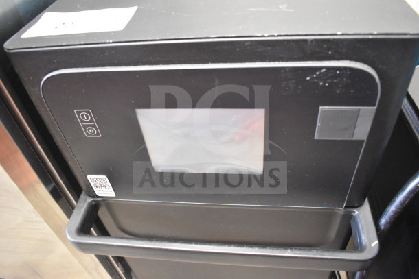 2025 Merrychef eikon e2s commercial microwave convection oven. Countertop model, 208/240V, touch controls, black finish.