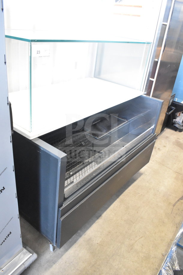 Commercial floor style horizontal grab-n-go merchandiser with top dry display case, in good condition.