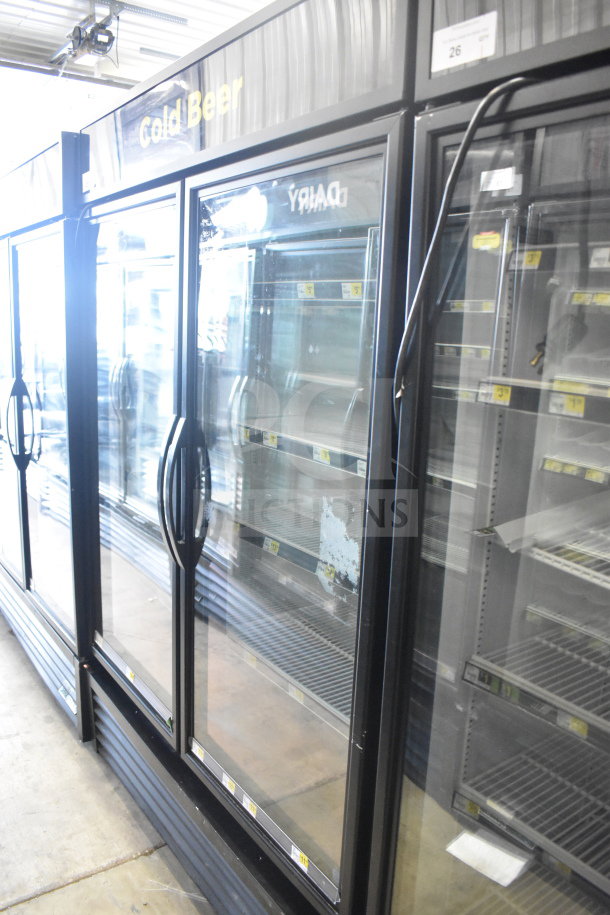 2019 True GDM-49-HC 2-door reach-in cooler merchandiser, tested and working, 115V, 1 phase, clean shelves, "Cold Beer" sign.
