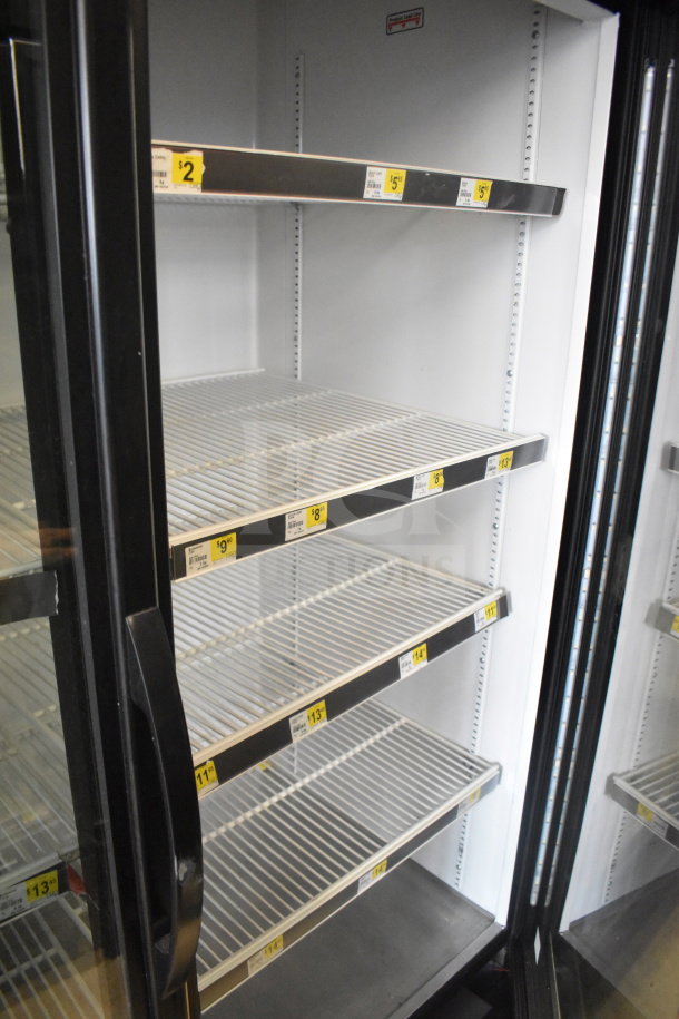 2019 True GDM-49-HC commercial 2-door reach-in cooler, 115 volts, tested and working, shelving visible.