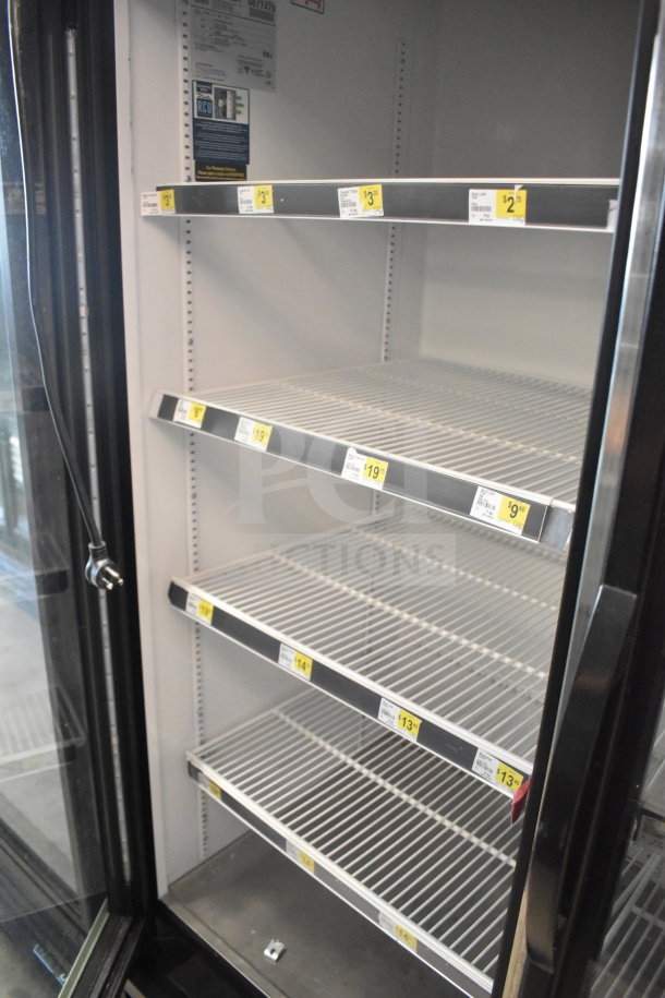 2019 True GDM-49-HC commercial cooler, dual glass doors, empty shelves, tested functioning, 115 volts, 1 phase.