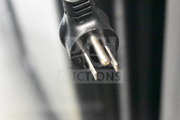 Close-up of a 115V power plug for a 2019 True GDM-49-HC commercial cooler, model GDM-49-HC, tested and working.
