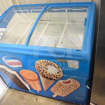 AHT RIO S 100 commercial chest freezer, 115 volts, 1 phase, features dual glass lids, vibrant ice cream graphics, tested working.