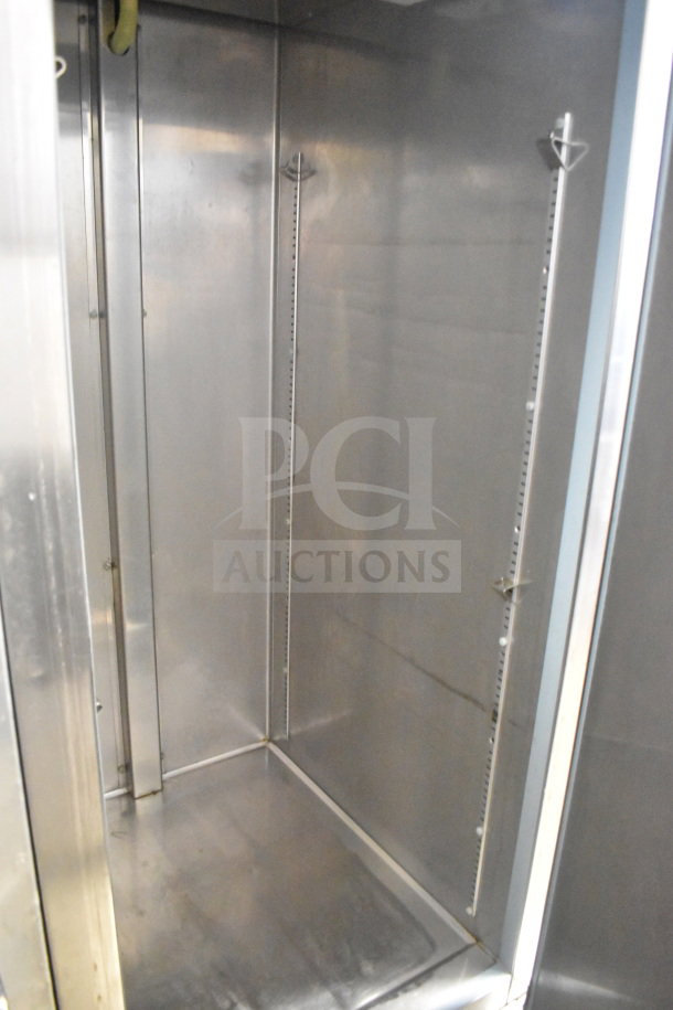 Ikon KB27R Commercial Single Door Reach In Cooler, stainless steel interior, on casters, 115V, 1 phase.