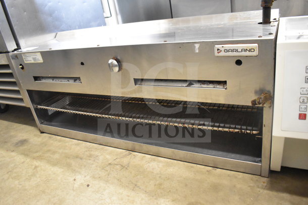 Garland Commercial Gas Powered Cheese Melter, stainless steel, includes adjustable rack, used condition, Garland branding visible.