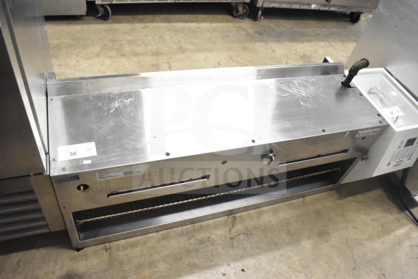 Garland Commercial Gas Powered Cheese Melter, stainless steel, used condition, visible controls, auction tag number 36.
