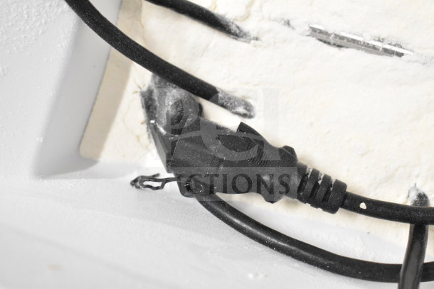 Fest Countertop Powder Dispenser showing electrical wiring and powder residue, highlighting its functionality and condition.