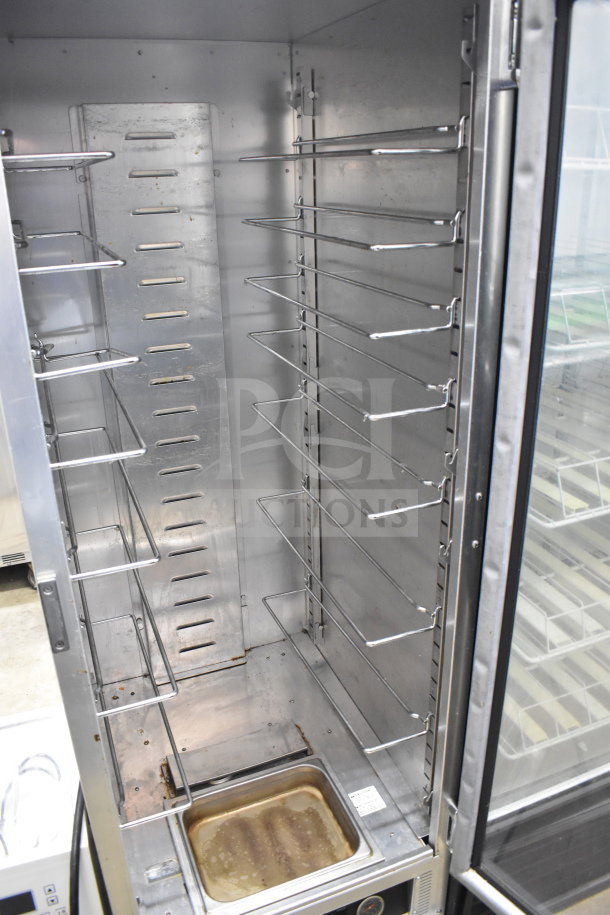 CresCor 121PHUA11D heated holding cabinet with shelves, commercial casters, 120V, 1 phase, clean interior, minor wear.