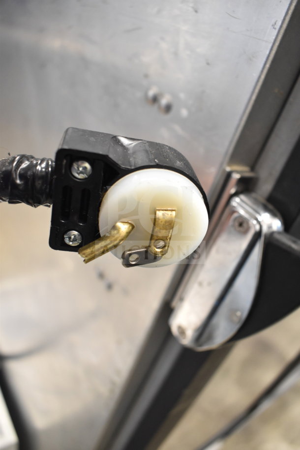 CresCor 121PHUA11D heated holding cabinet plug detail, showing power connection on sturdy stainless steel body.