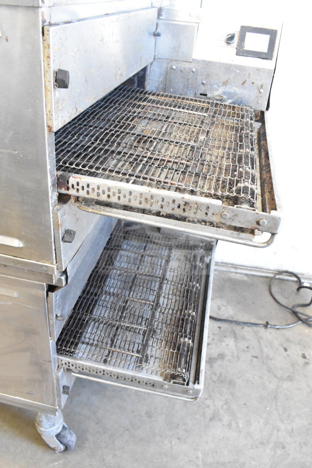 Two 2021 Middleby Marshall PS638G stainless steel conveyor pizza ovens on casters, natural gas powered, 89,000 BTU, tested and working.