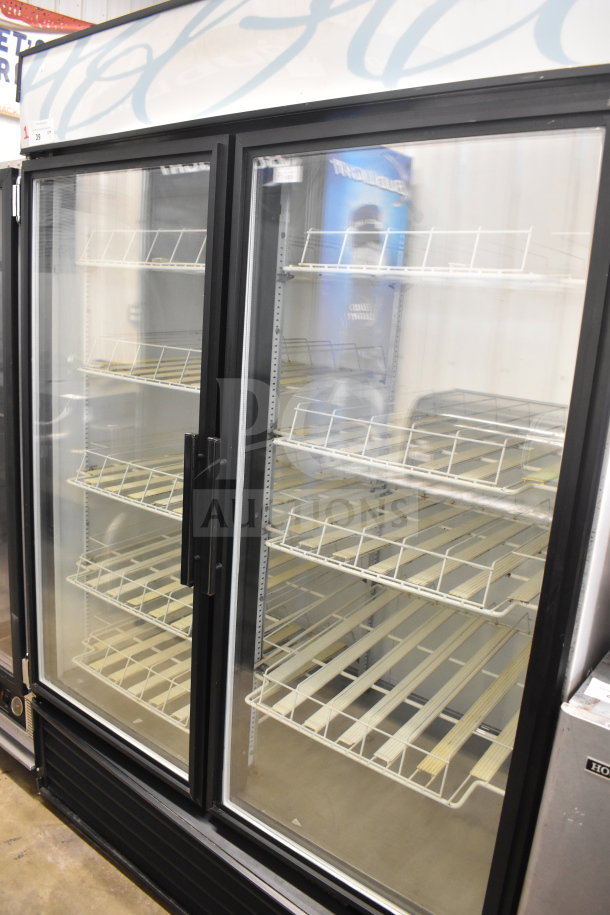 True GDM-49 Commercial 2-Door Reach-In Cooler Merchandiser, 115V, 1 Phase, empty interior shelves, glass doors.