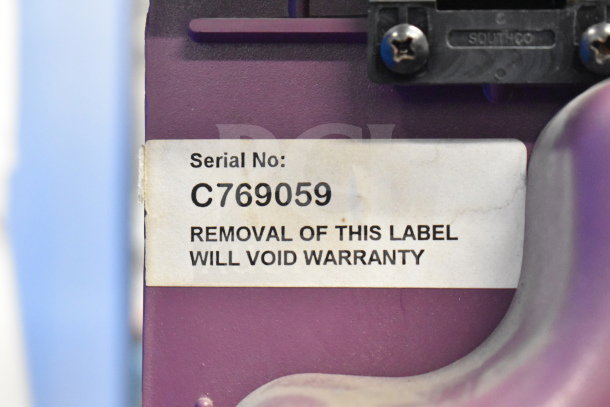 Serial number label reads "C769059; removal voids warranty" on a Countertop Dry Merchandising Display Case.