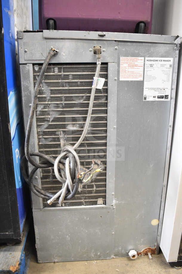 Hoshizaki KM-650MAH commercial ice machine head, 208-230 volts, 1 phase. Visible connections and model label. Used condition.