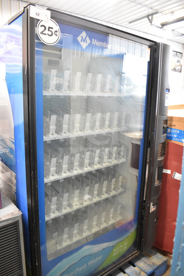 Crane 5800-4 commercial vending machine with bill acceptor, 115V, 1 phase. Features multiple slots, 25-cent pricing.