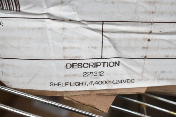 Box containing i2Systems light fixtures, described as shelf light, 4', 4000K, 24VDC. Code 221312 visible on label.