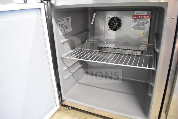 2023 Delfield 406P-STAR2 undercounter cooler; single door, commercial casters, interior shelf, safety labels, 115V.