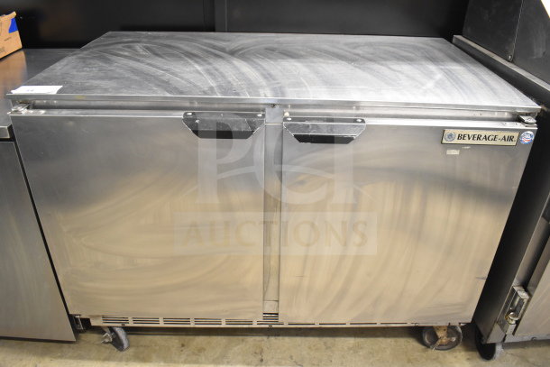 Beverage Air UCR48A commercial cooler, 2-door, undercounter, on casters. Stainless steel, 115V, used condition. Model label visible.