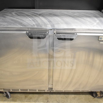 Beverage Air UCR48A commercial cooler, 2-door, undercounter, on casters. Stainless steel, 115V, used condition. Model label visible.