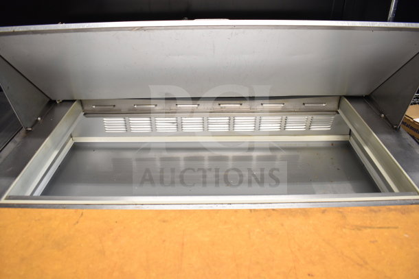 Beverage Air commercial sandwich salad prep table with bain marie top on casters, 115 volts, 1 phase, open lid view.