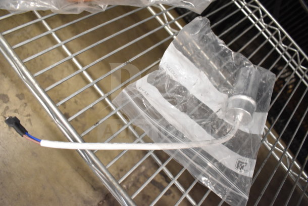 Brand new HPCONLOOP284 Turbo Air Refrigeration Condensate Loop in clear packaging on metal shelf.