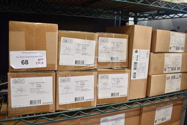 Boxes of DualLite EVODW Double Remote Head, EVHC6IDP-WM Commercial LED Emergency Light. New condition, auction quantity 10.