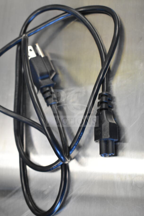 Power cable for TSC TC210 Thermal Transfer Label Printer, showing standard plug and connector in good condition.