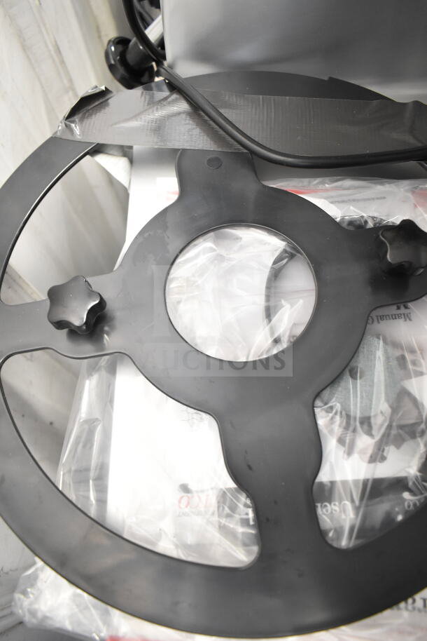 Brand new Avantco 177SL713MAN 13" medium-duty manual meat slicer with scratch and dent, 120V.