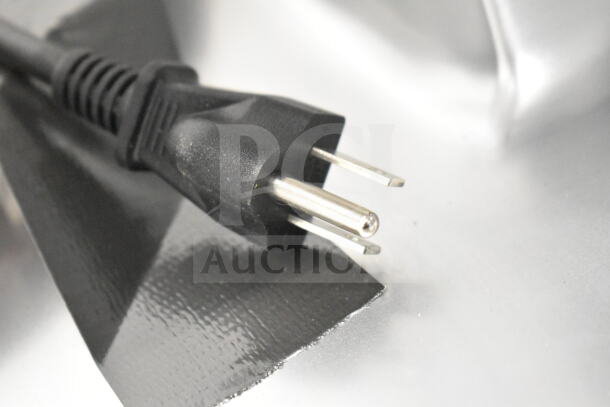 Electric plug detail of a new Avantco 177SL713MAN 13" manual gravity feed meat slicer, for 120 volts, 1 phase use.