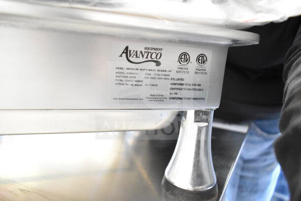Brand new Avantco 177SL713MAN 13" manual meat slicer with ETL certification labels. 120V, 1 phase, scratch and dent condition.