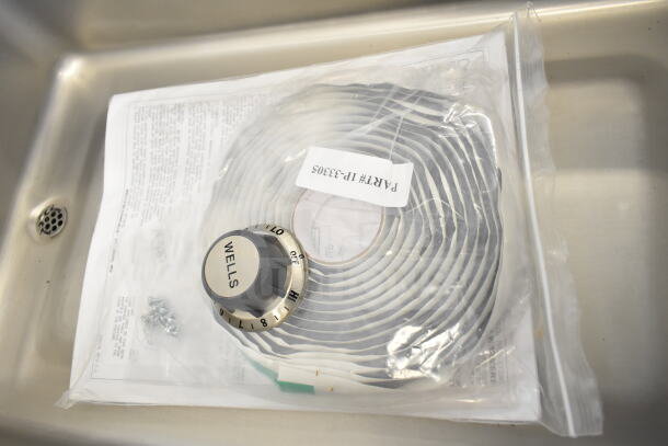 BRAND NEW Wells MOD200TDM hot food well, insulated, thermostatic control, 2 compartments, 208/240V, 1 phase, with manual.